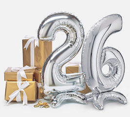 silver letter balloons and gold boxes