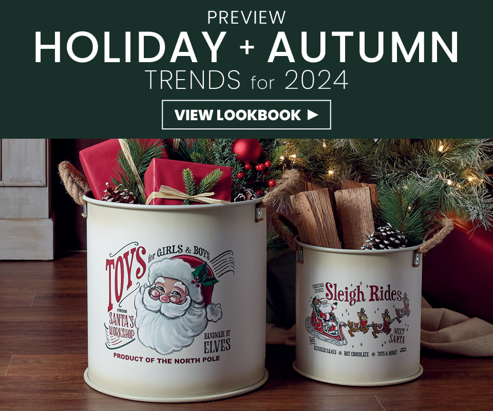 tin mugs and holiday decorations on tablet