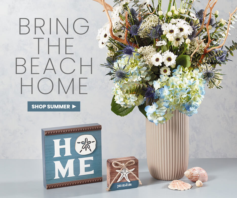 home decor signs and flower vase on tablet